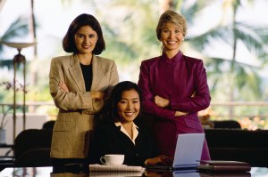 Three Smiling Businesswomen